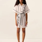 Lily Embroidery Mini Dress in Ivory – front model view
