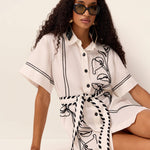 Lily Embroidery Mini Dress in Ivory – model view 2