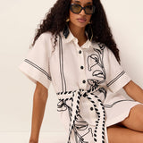Lily Embroidery Mini Dress in Ivory – model view 2