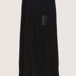 Black pleated skirt with lace waistband on a light gray background