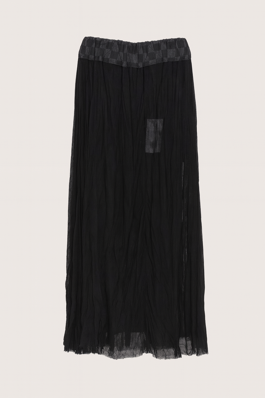 Black pleated skirt with lace waistband on a light gray background